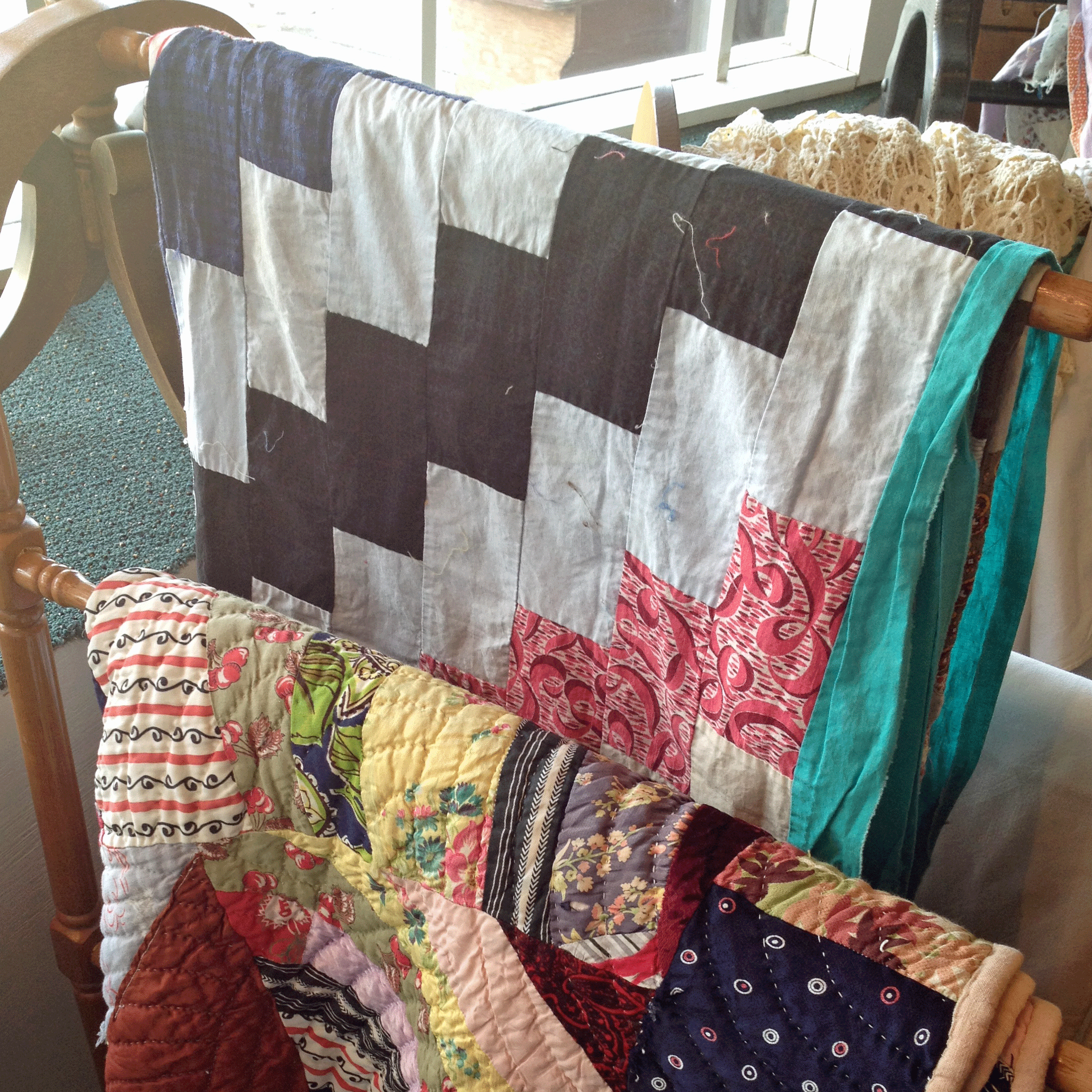 Cozy comfort is the name of the game when you're cocooned in hand-made quilts inside your tent.