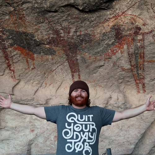 Lifelike, right? Just kidding, that's Josh. Above him is one of the most impressive pictographs, possibly depicting a shaman