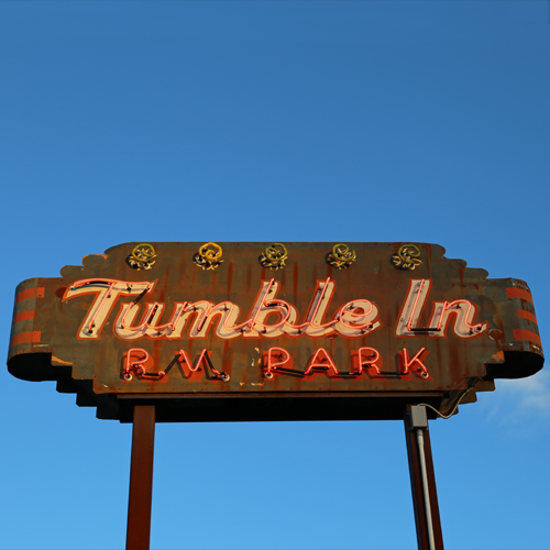 The neon tumbleweed on the sign actually tumbles