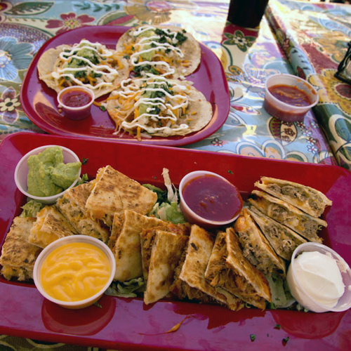 Beef, chicken and carne adovada quesadillas and tacos