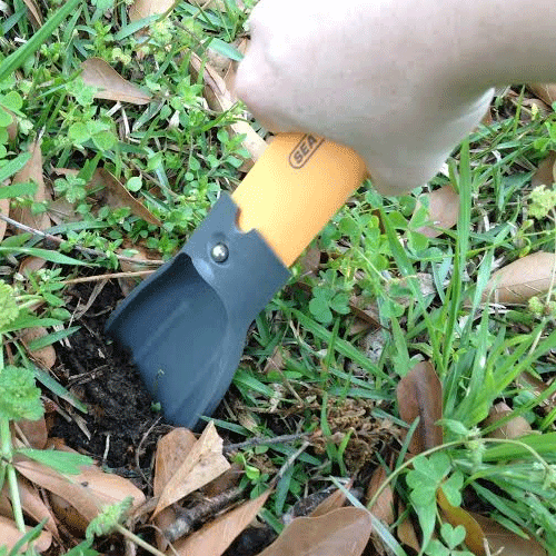 This collapsible Sea to Summit trowel is used to dispose of human waste on the trail