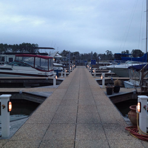 Lights along the pier at dusk